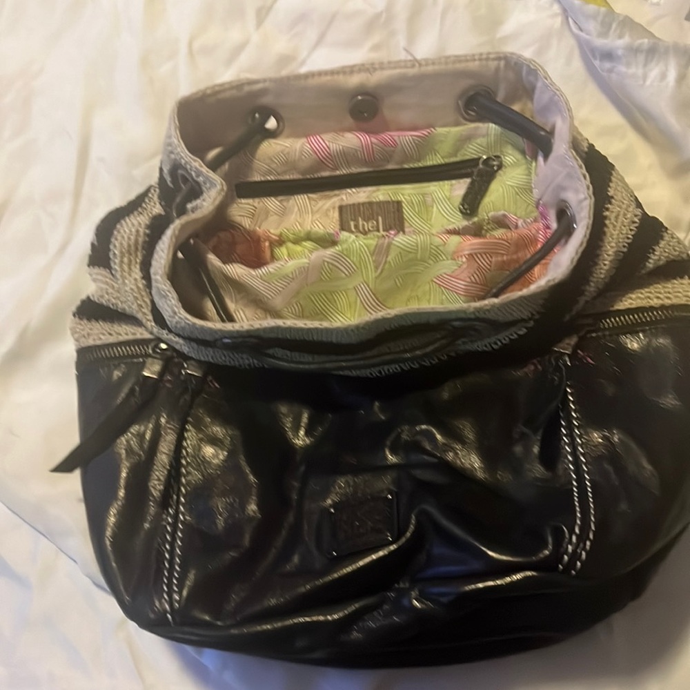 The SAK black/ cream excellent condition. Backpack.